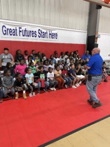 Flag folding at Avon Park Boys & Girls club